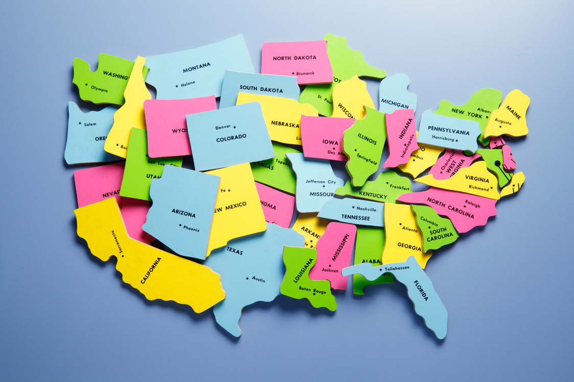 Randomly Placed Puzzle Pieces Representing The 50 states Of The United States
